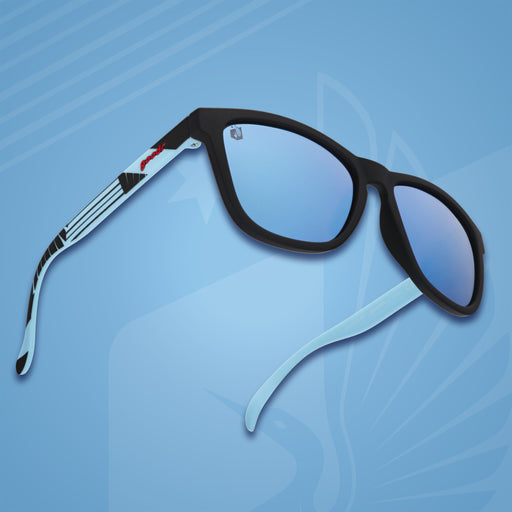 Three-quarter angle front view of Minnesota United FC shades on a blue background. Blue+black frames. Blue reflective lenses.