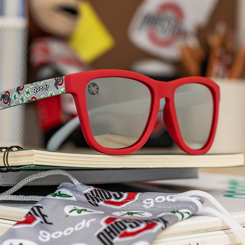 A pair of Ohio State special edition goodr sunglasses in red and grey