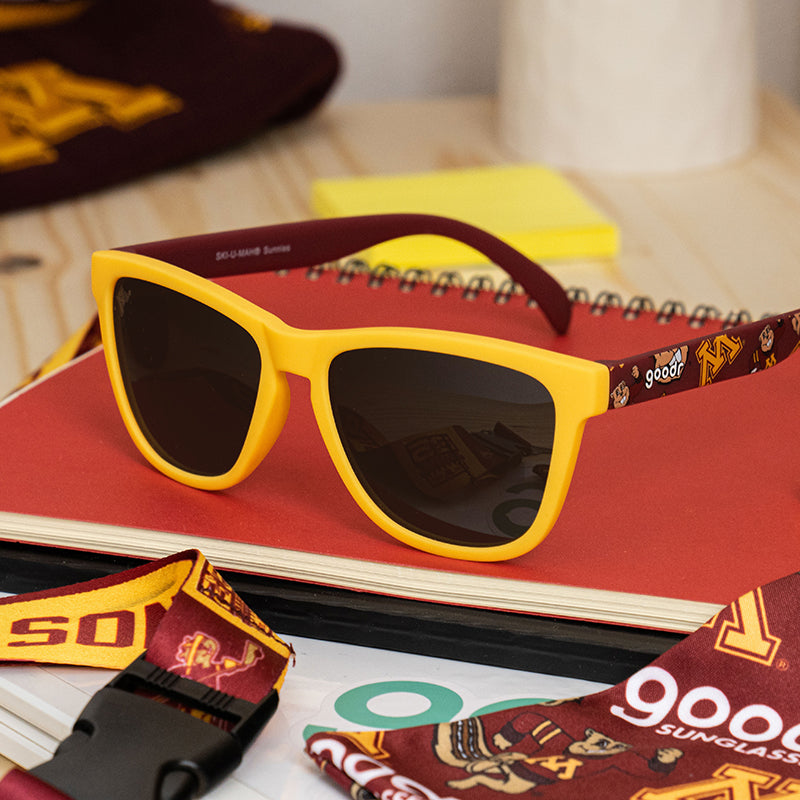 University of Wisconsin goodr sunglasses with yellow frames and dark red temples