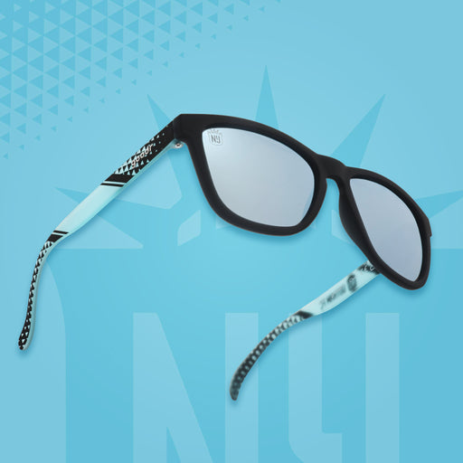 Sunglasses with blue patterned frames on a blue geometric patterned background