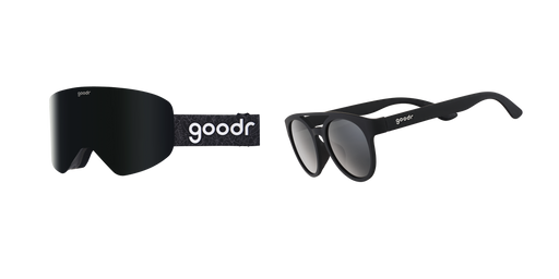A set of two black eyewear items: a pair of wrap-around snow goggles on the left and classic black sunglasses with dark lenses on the right, both branded "goodr."